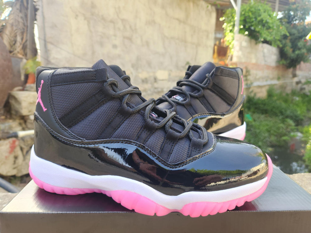 Air Jordan 11 Retro Black and Rose Red Sneakers