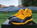 Air Jordan 11 Orange Yellow and Black Sneakers