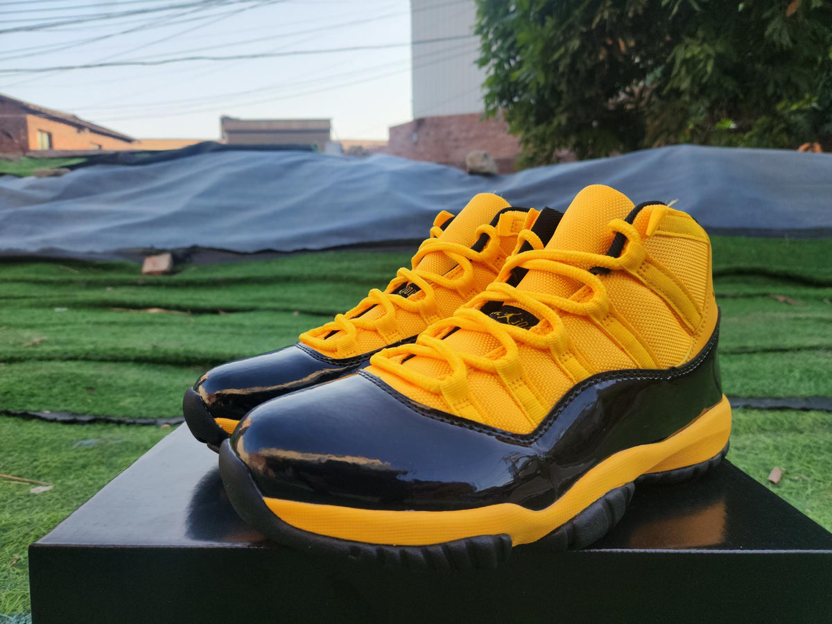 Air Jordan 11 Orange Yellow and Black Sneakers