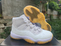 Air Jordan 11 Retro High-Frequency White and Light Yellow Sneakers