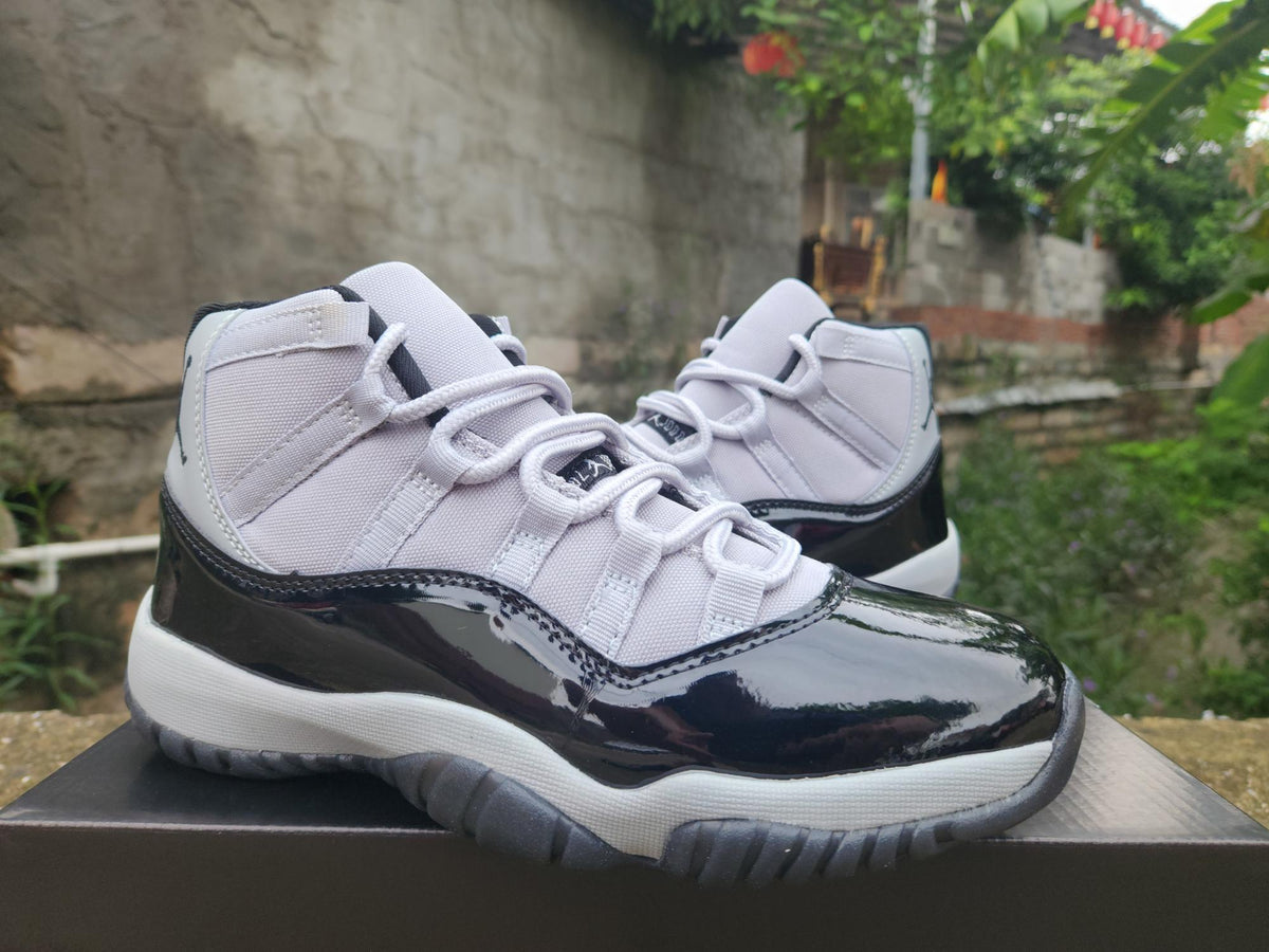 Air Jordan 11 Grey and Black Sneakers