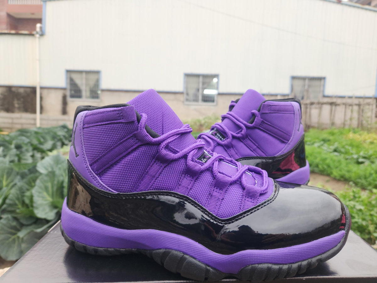 Air Jordan 11 Retro Black and Purple Sneakers