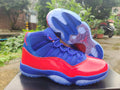 Air Jordan 11 Red and Royal Blue Sneakers