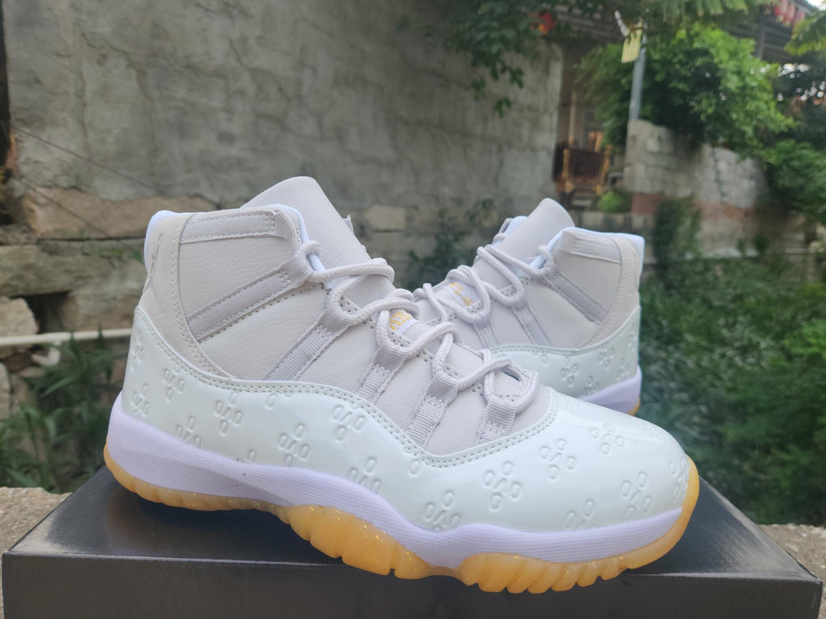 Air Jordan 11 Retro High-Frequency White and Light Yellow Sneakers