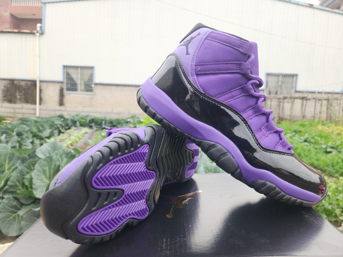 Air Jordan 11 Retro Black and Purple Sneakers