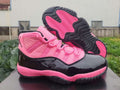 Air Jordan 11 Retro Black and Pink Sneakers