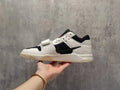 Travis Scott Reverse Swoosh Low-Top Sneakers