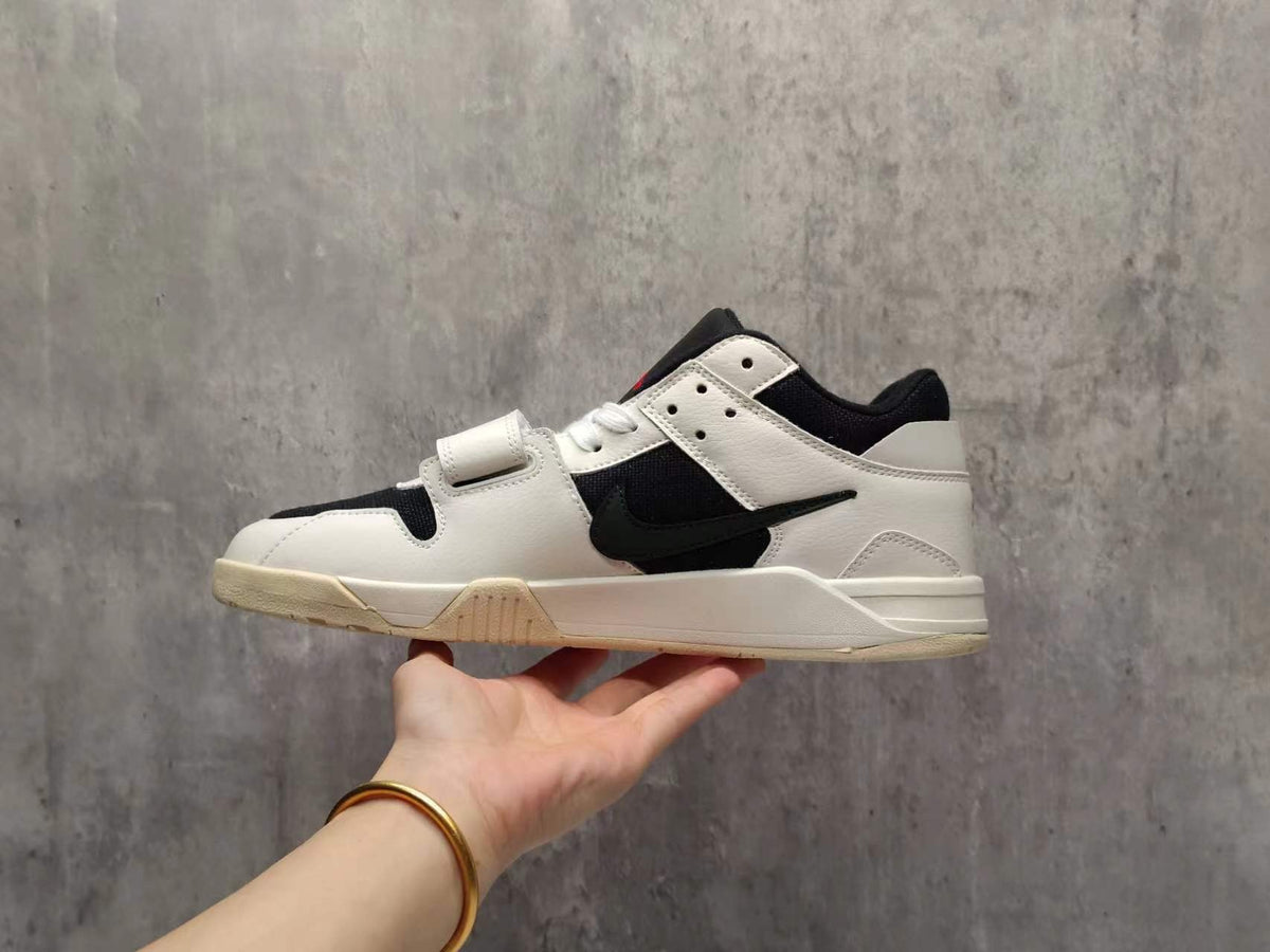 Travis Scott Reverse Swoosh Low-Top Sneakers