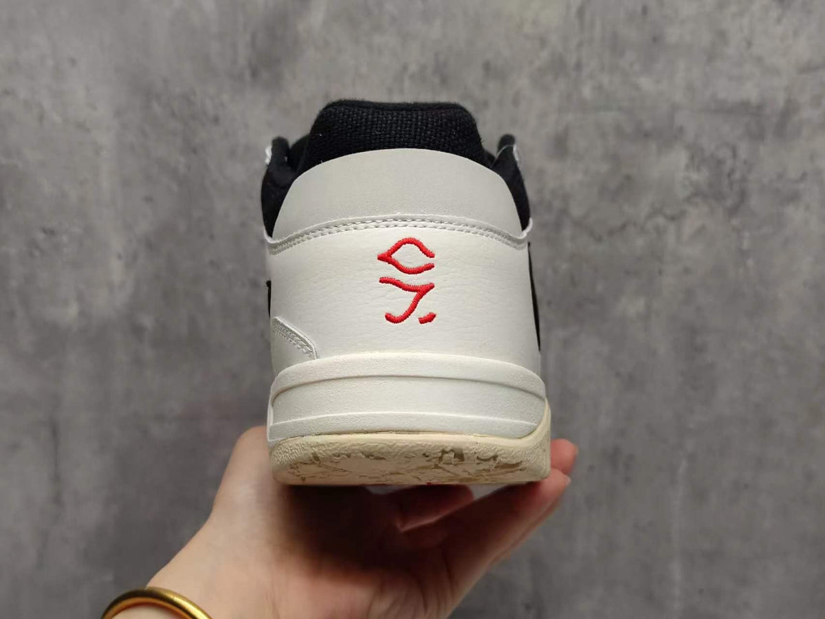 Travis Scott Reverse Swoosh Low-Top Sneakers