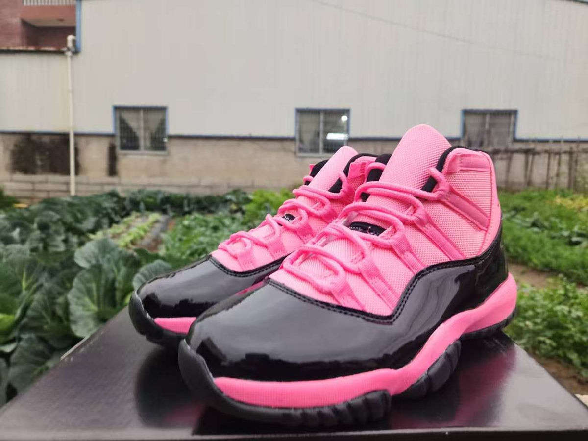 Air Jordan 11 Retro Black and Pink Sneakers