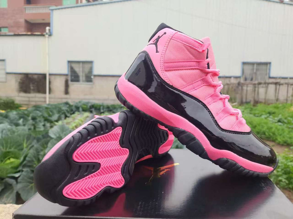 Air Jordan 11 Retro Black and Pink Sneakers