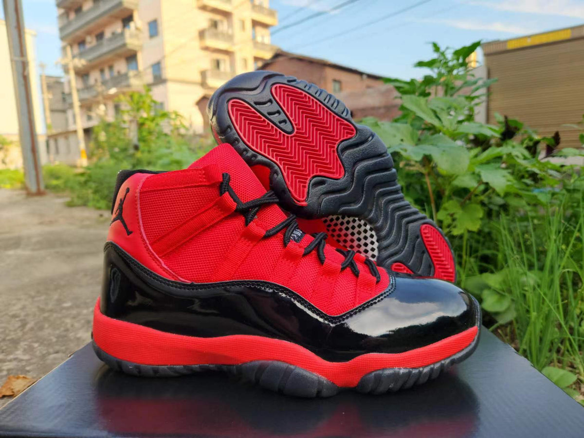 Air Jordan 11 Red Black Sneakers