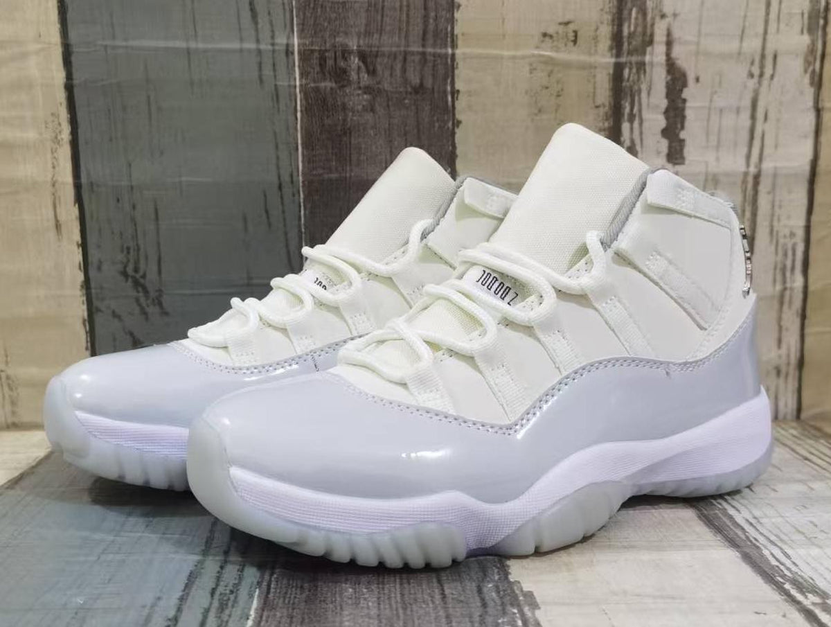 Air Jordan 11 Retro Off-White and Grey Sneakers