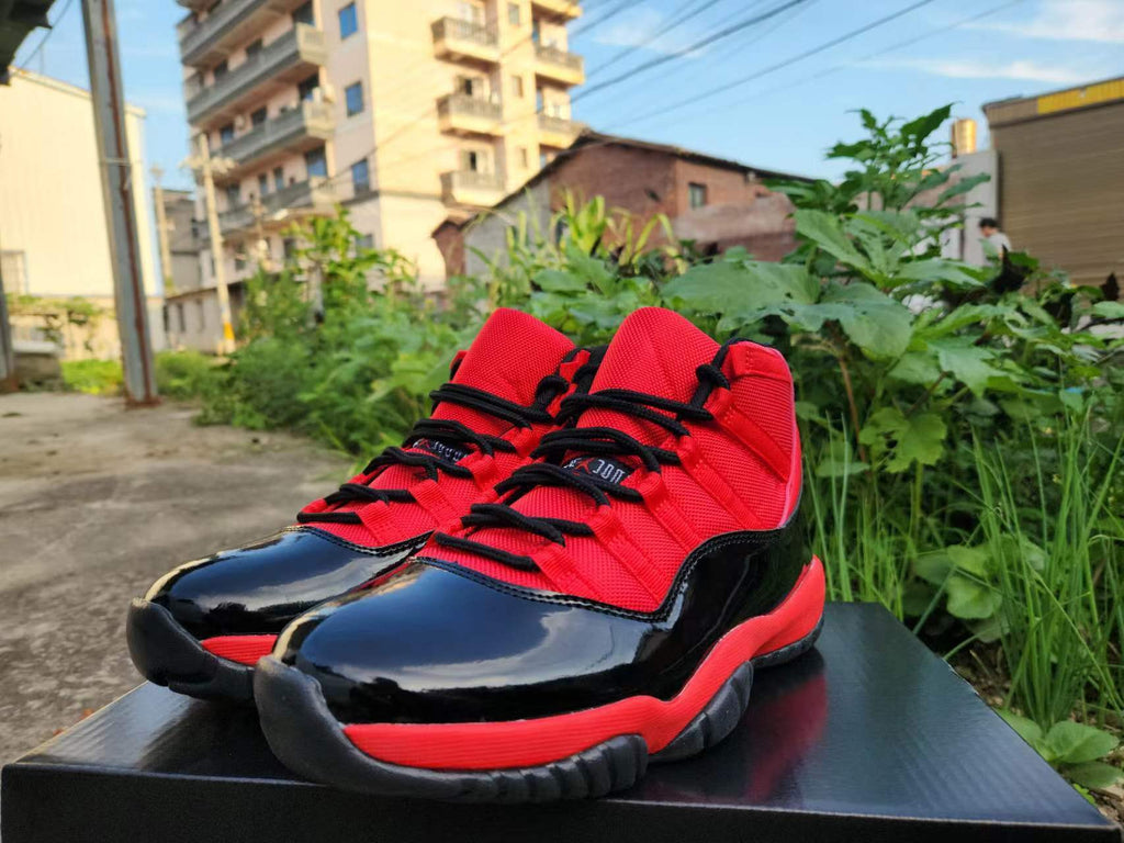 Jordan 11 Red and Black Sneakers