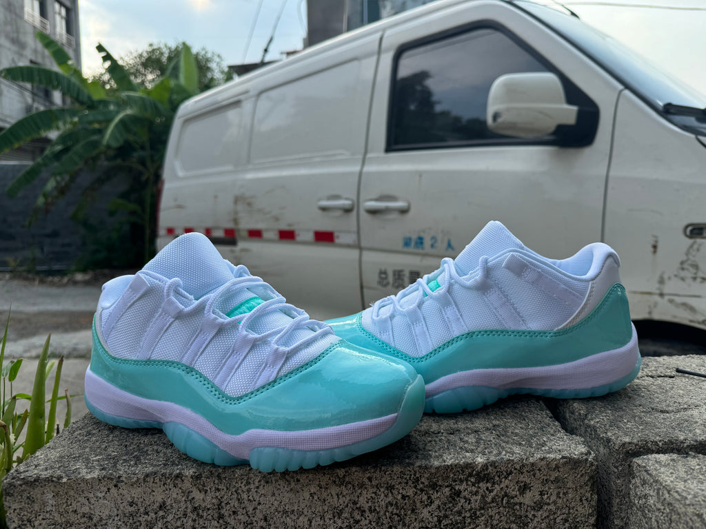 Air Jordan 11 White Light Green Sneakers