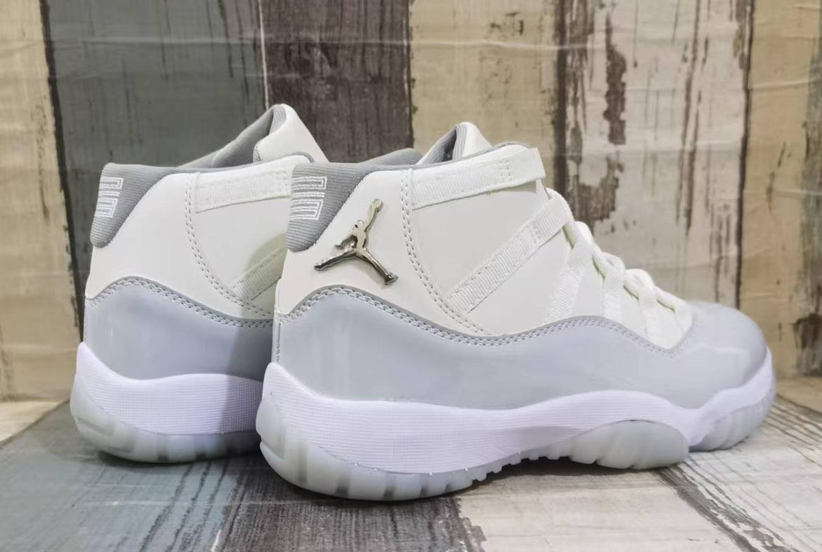 Air Jordan 11 Retro Off-White and Grey Sneakers