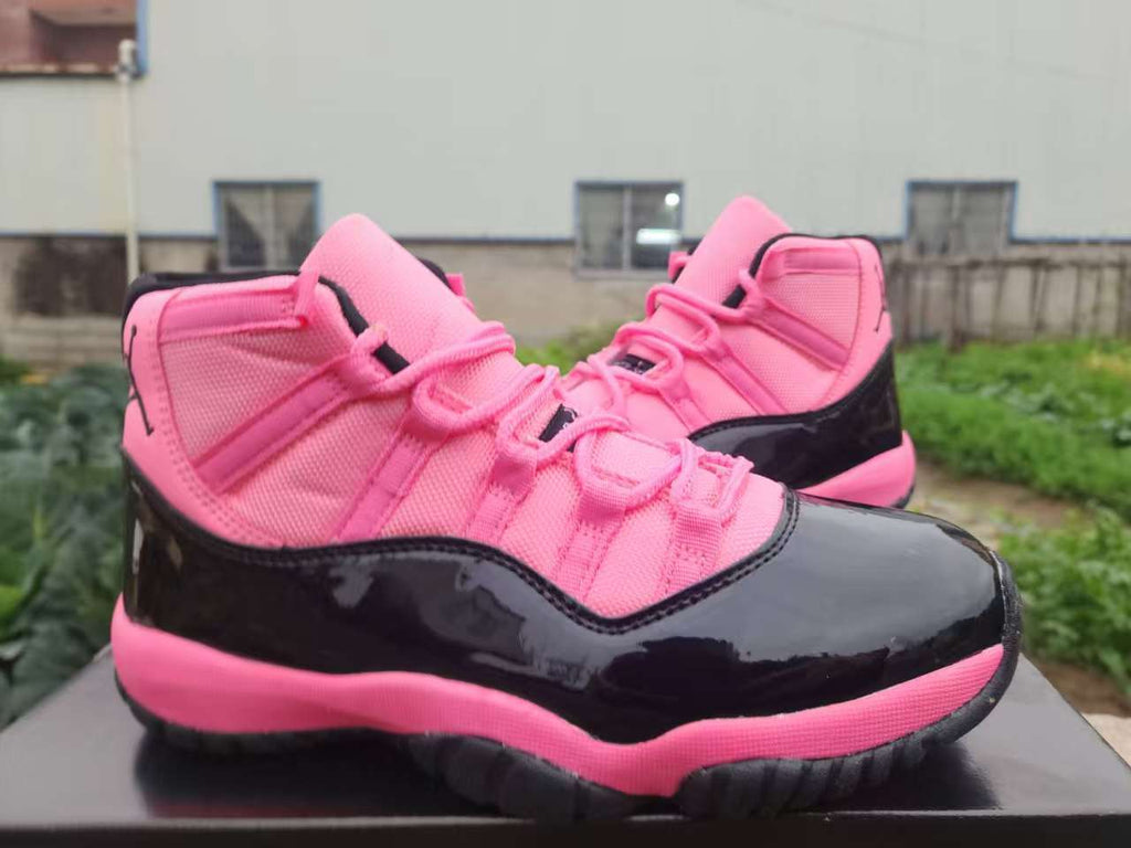 Air Jordan 11 Retro Black and Pink Sneakers